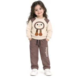 ست بلوز و شلوار دورس 1 تا 3 سال کد 1142 طرح penguin رنگ کرم مبین Mobin